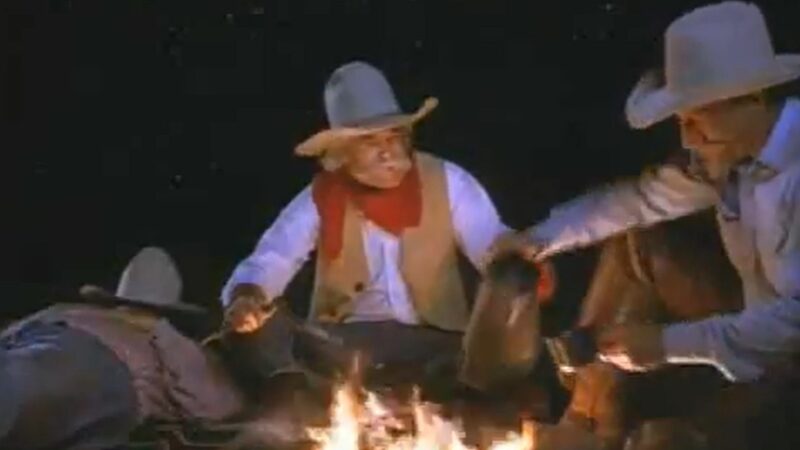 Cowboys around a campfire recite a poem about keeping Texas clean.