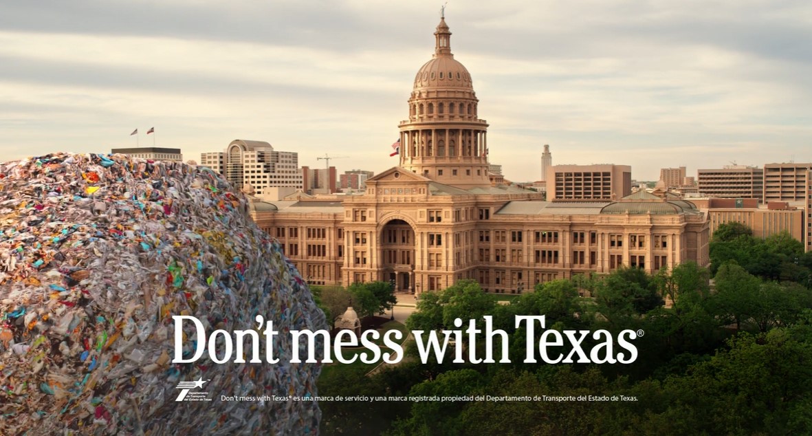 A ball of litter in front of the Texas state capital building.